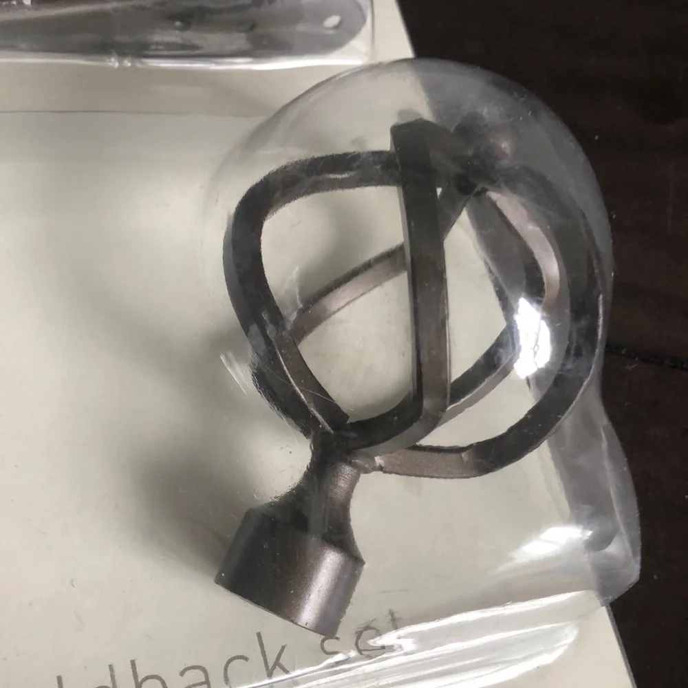 Decorative window hardware holdback set